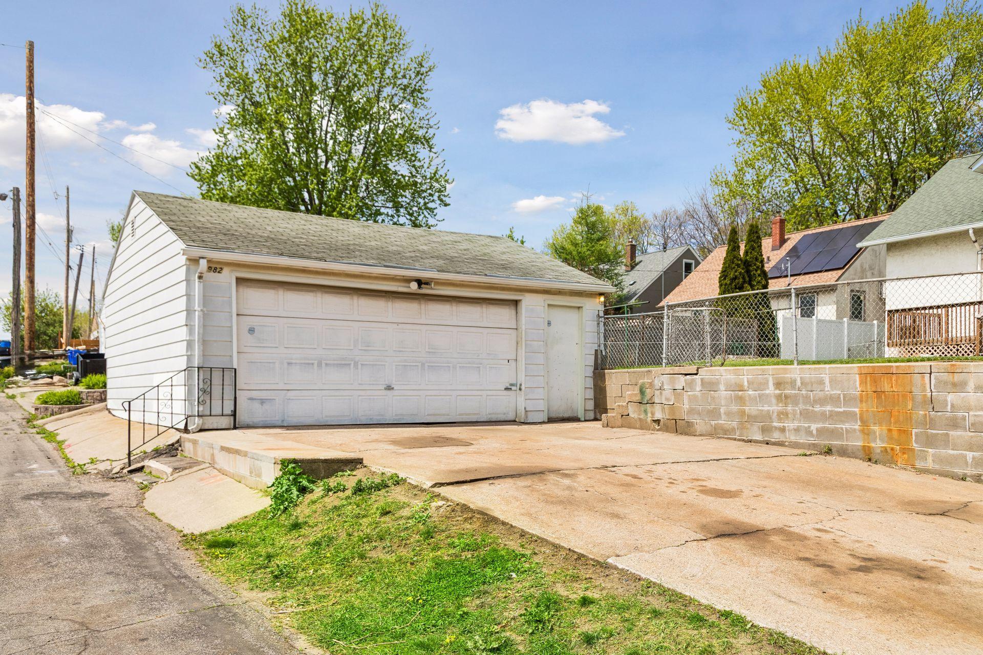 Long concrete driveway for additional off-street parking.