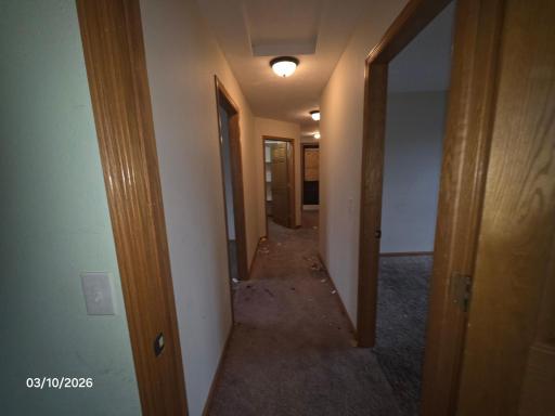 Hallway upstairs with 3 bedrooms, bathroom
