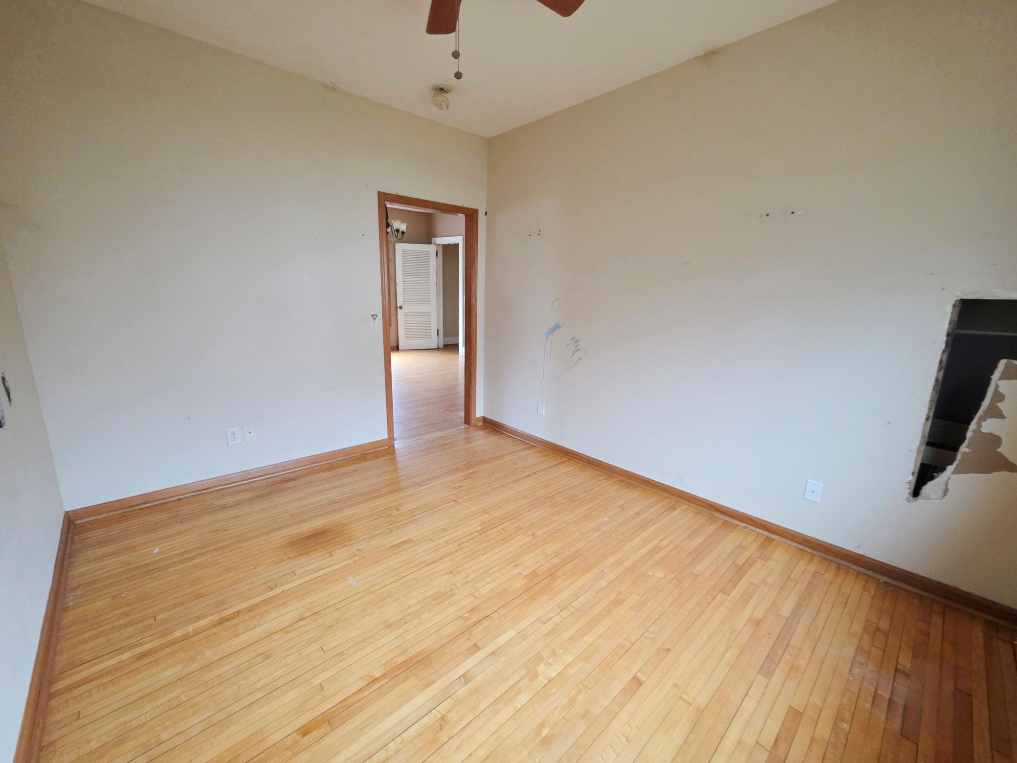 Main floor den view from near window facing living room