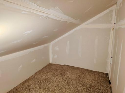Another storage area upstairs accessed from hallway