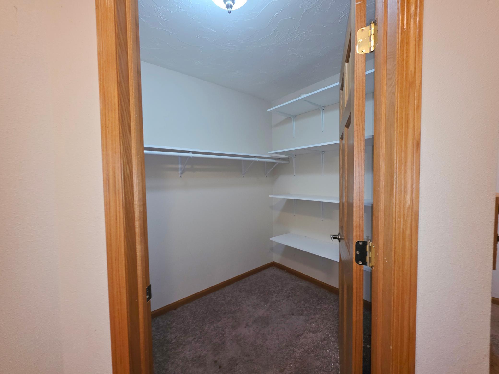 Another view of the great upstairs hall walk-in closet
