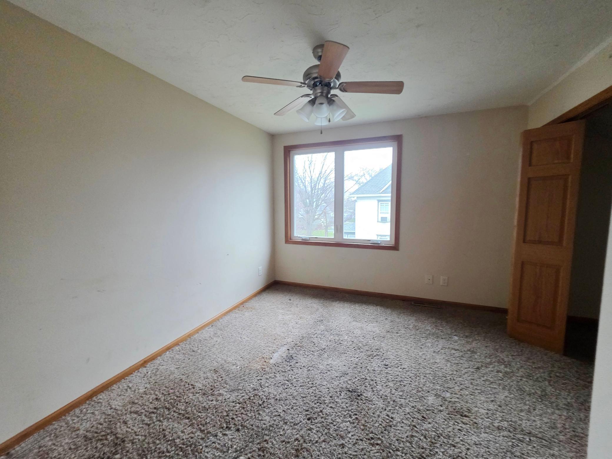Another of the 3 upstairs bedrooms with large walk-in closets