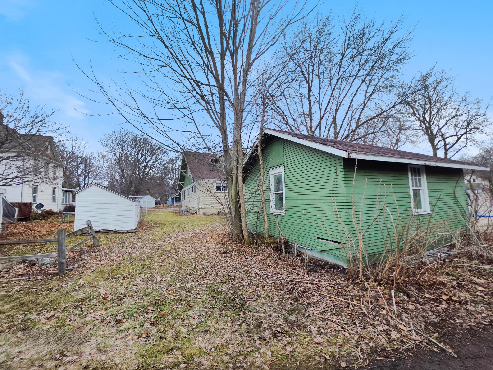 Back yard off alley is the detached one-car garage