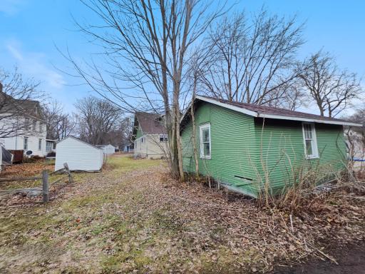 Back yard off alley is the detached one-car garage