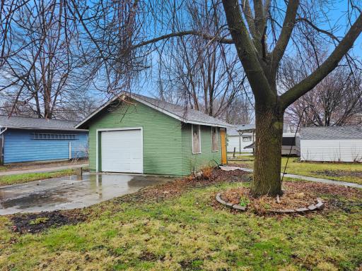 Backyard is host to the one-car garage just off the alley