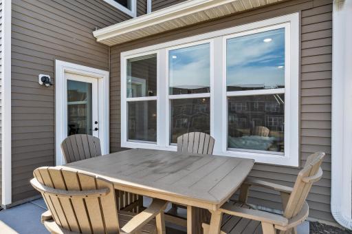 Back patio space accessible by sunroom walk out.