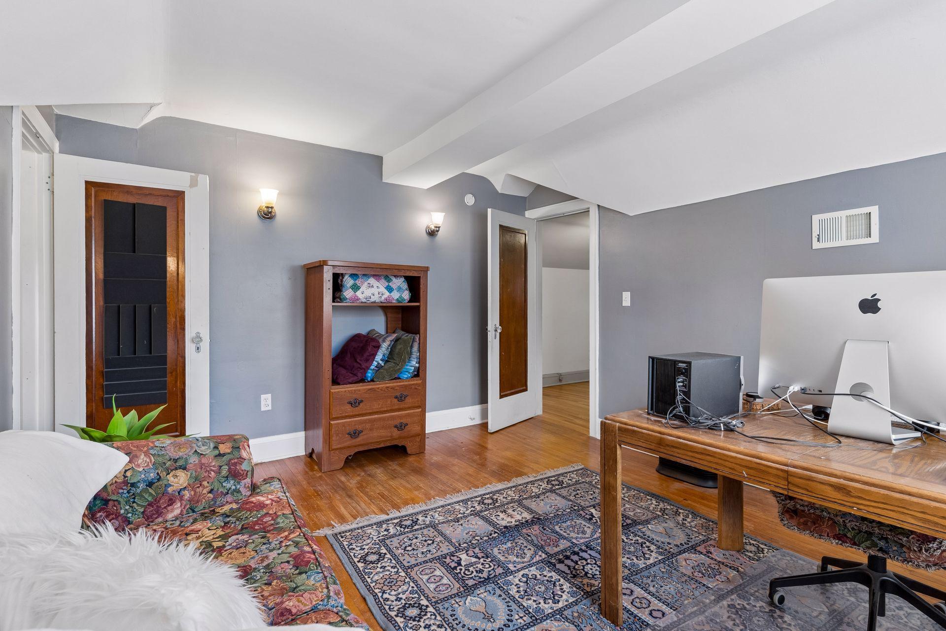 Bedroom 4 upper level. Walkthrough closet on left.