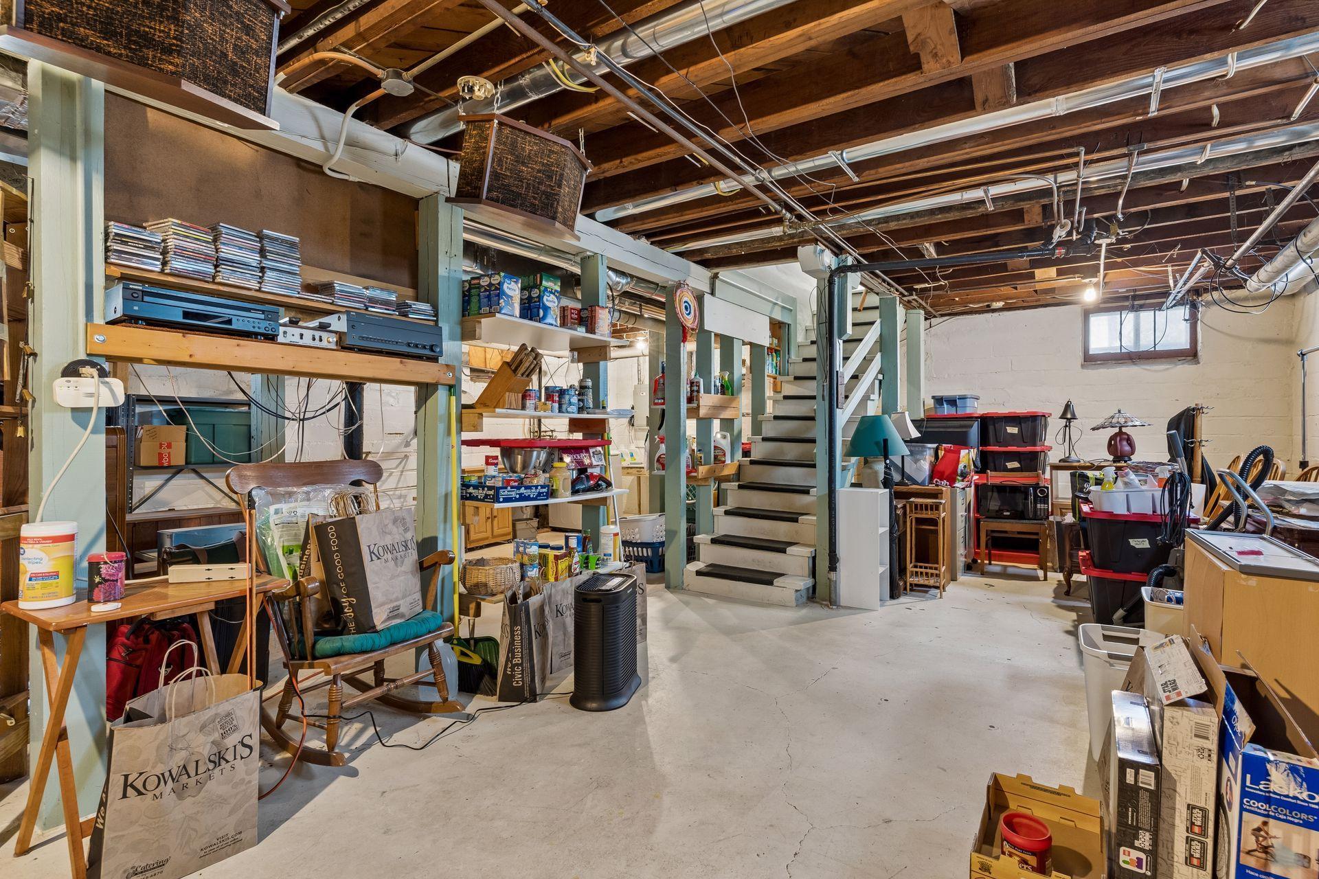 Large open basement with high ceilings.