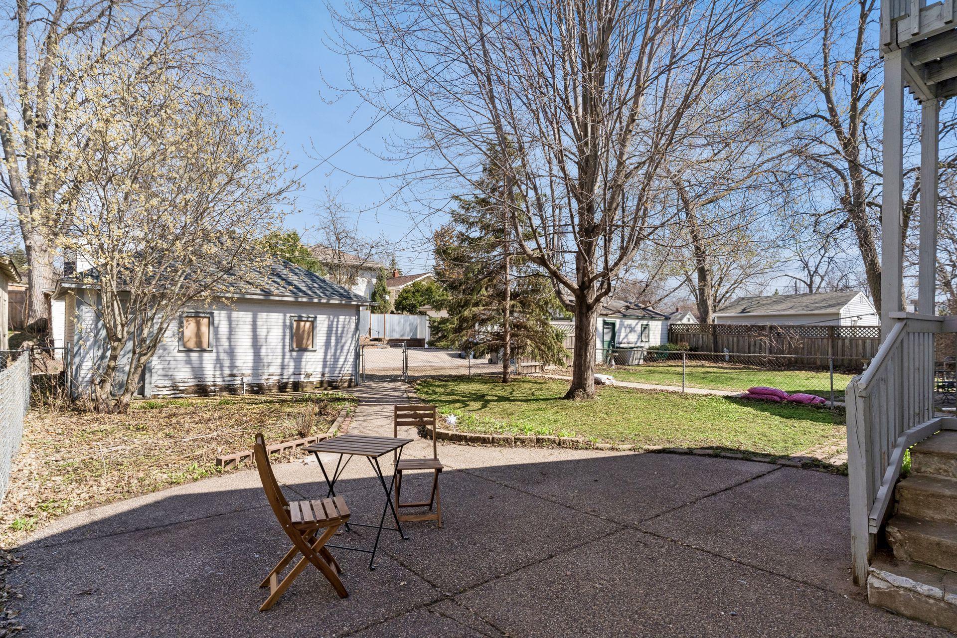 Fully fenced yard with patio.