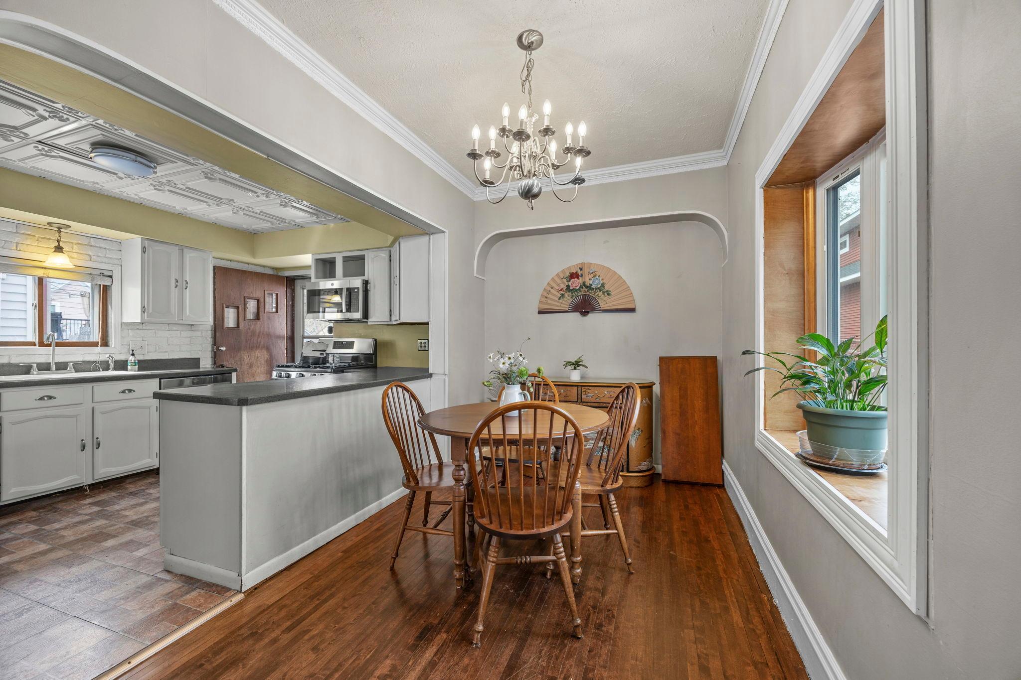 Perfect dining area with room for a buffet on the back wall. New bay window.