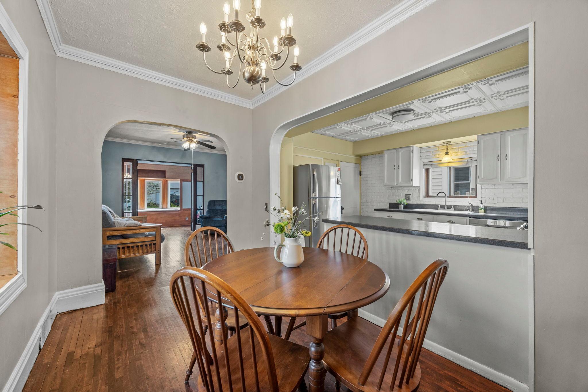 Lovely formal dining room with new bay window and white woodwork.