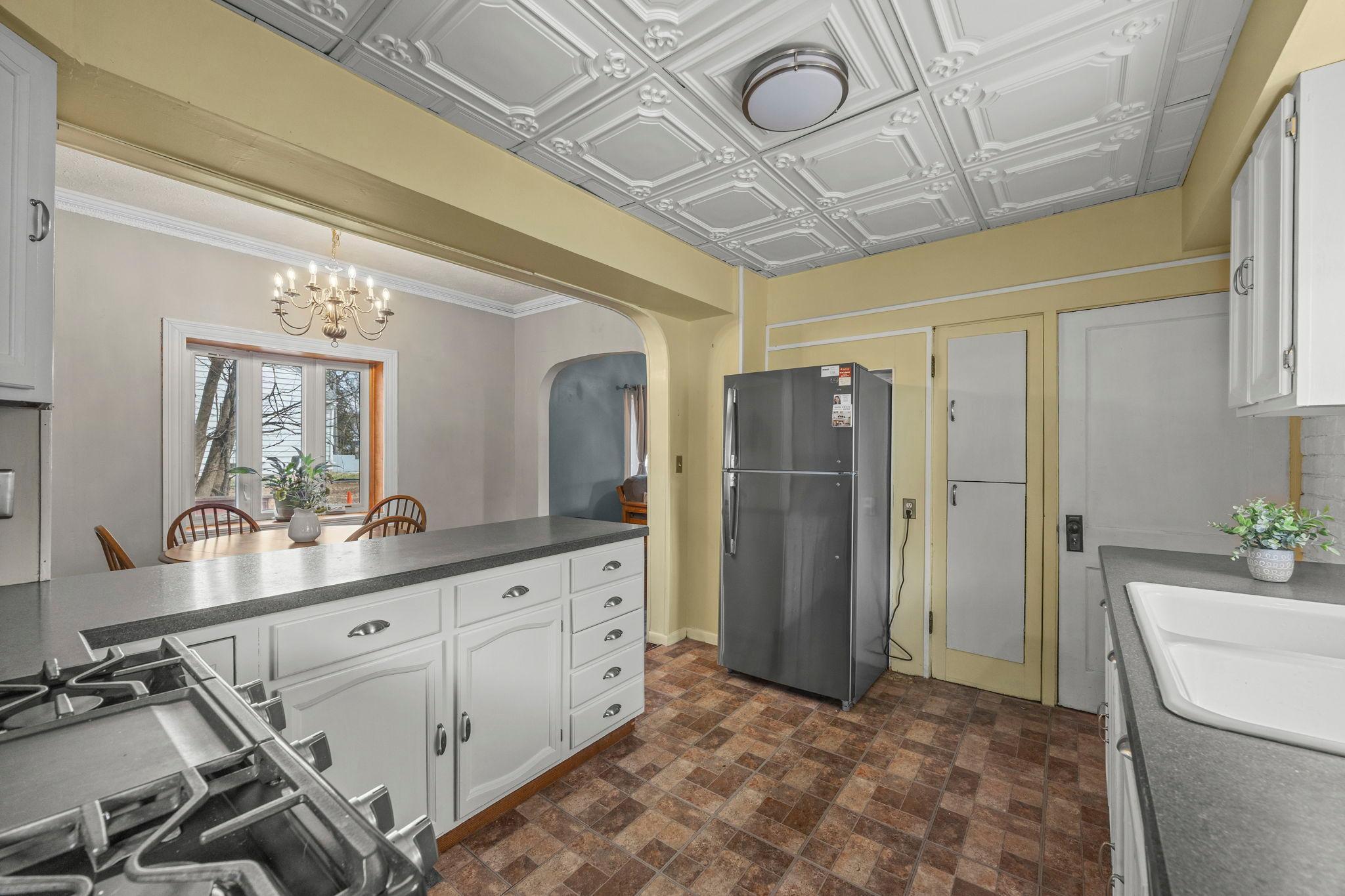 Super functional kitchen you will love to cook in. It's very open and bright, with lots of cabinets and counterspace! New stainless steel appliances including gas stove.