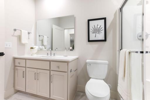 The lower level stylish Â¾ bathroom is perfect for guests or multigenerational living.