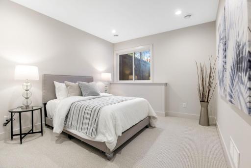 The lower-level bedroom offers comfort and convenience.