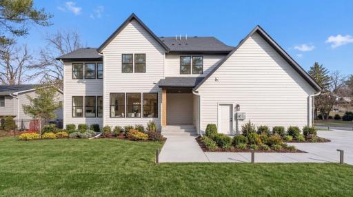Whether you're hosting gatherings or simply going about your daily routine, this custom-built home provides an unparalleled setting for modern living. ***Landscaping shown is for illustrative purposes only