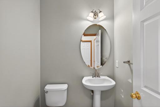 Convenient main level half bath for guests.