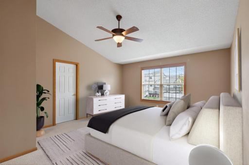 Large primary suite with vaulted ceilings and plenty of space to create your own relaxing retreat. Virtually Staged