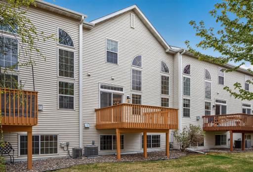 Spacious deck and oversized windows bring in tons of natural light while connecting indoor and outdoor living beautifully.