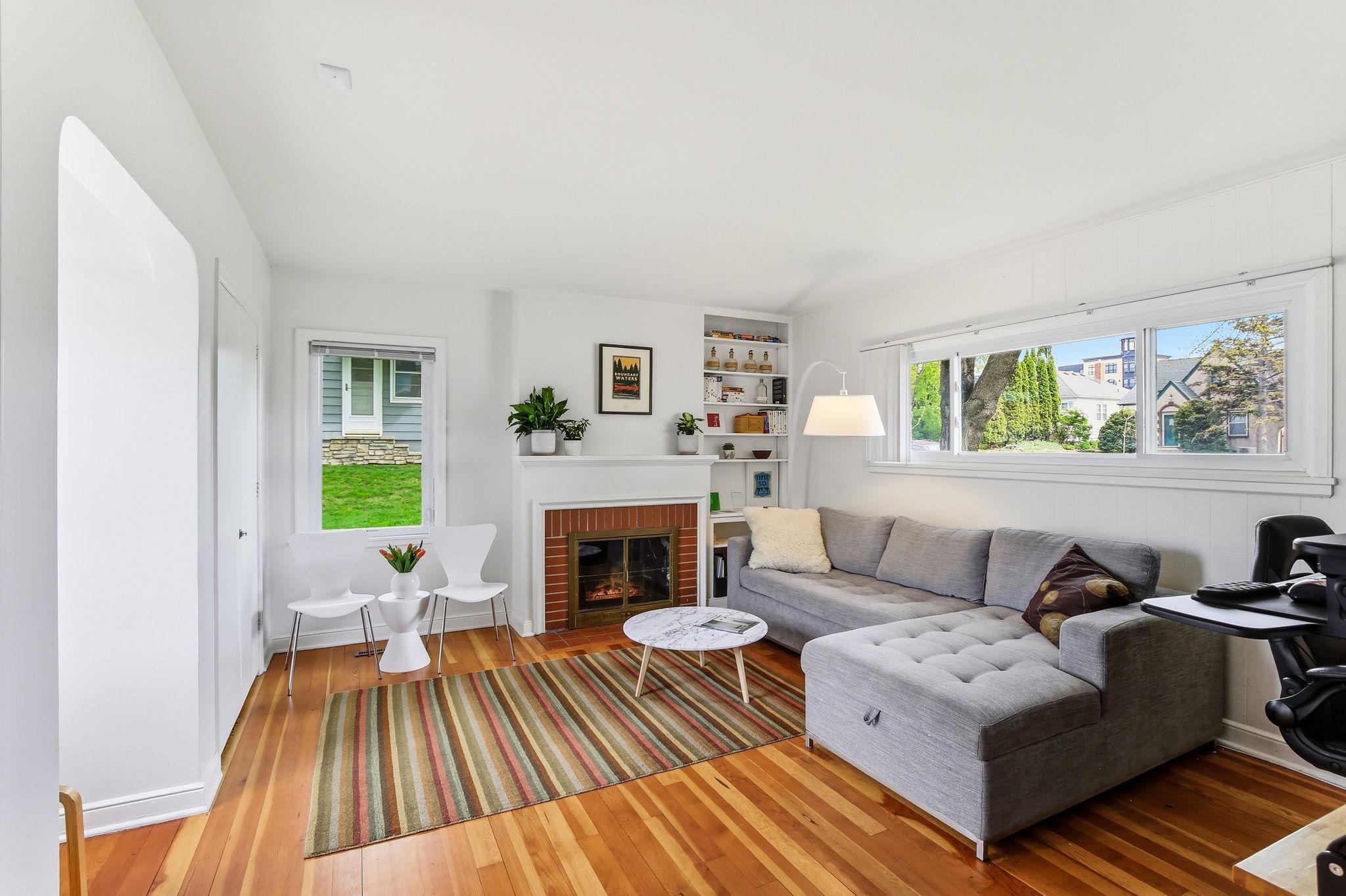 Bonus, main floor room could serve as a home office, guest suite, 6th bedroom or cozy den!