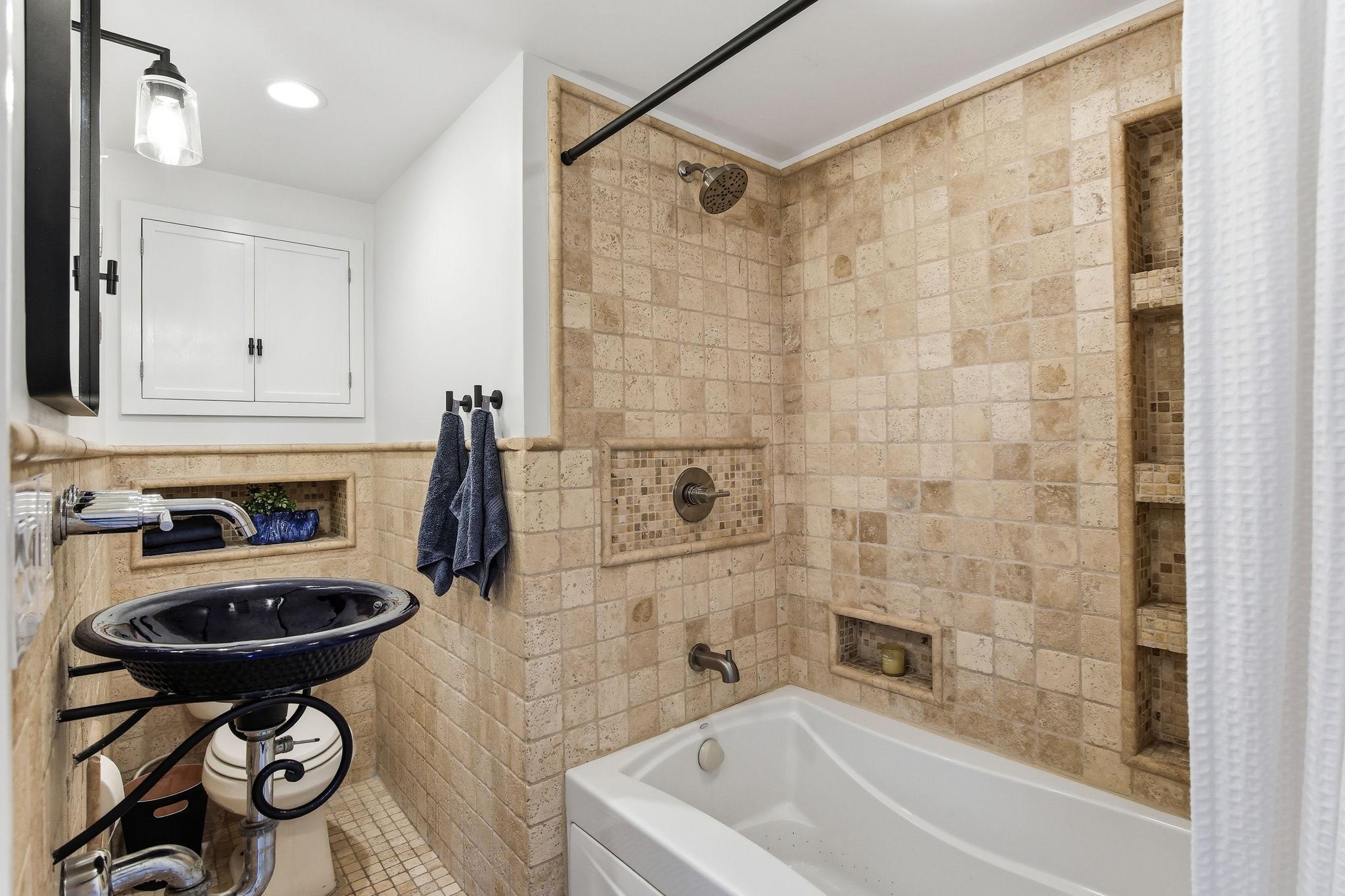 Main floor, full bath is perfect for company or overnight guests!