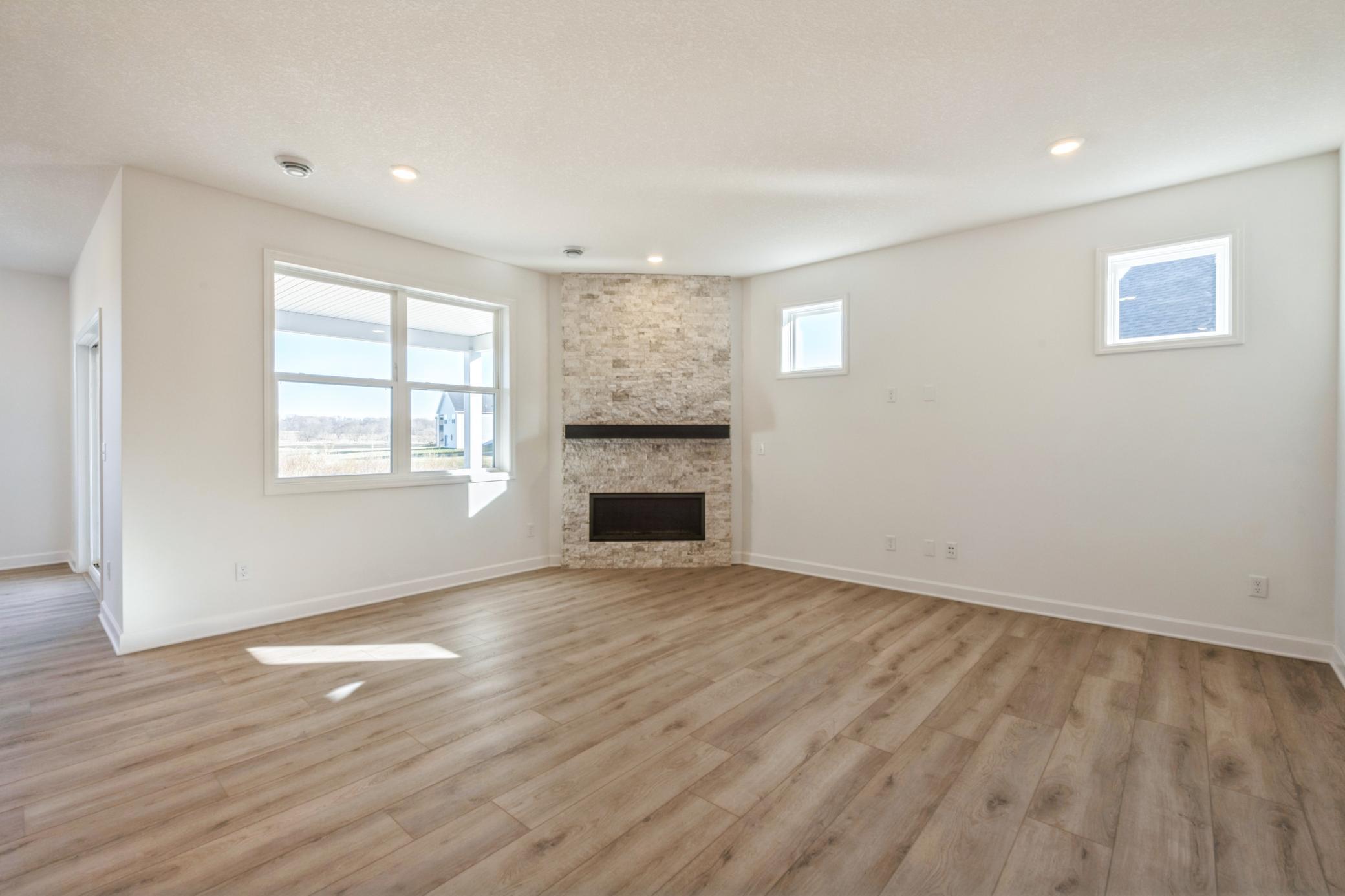 (Photo of a similar home, actual finishes may vary) Spacious and inviting, the Great Room is the perfect place to hang out with friends, watch movies and entertain.