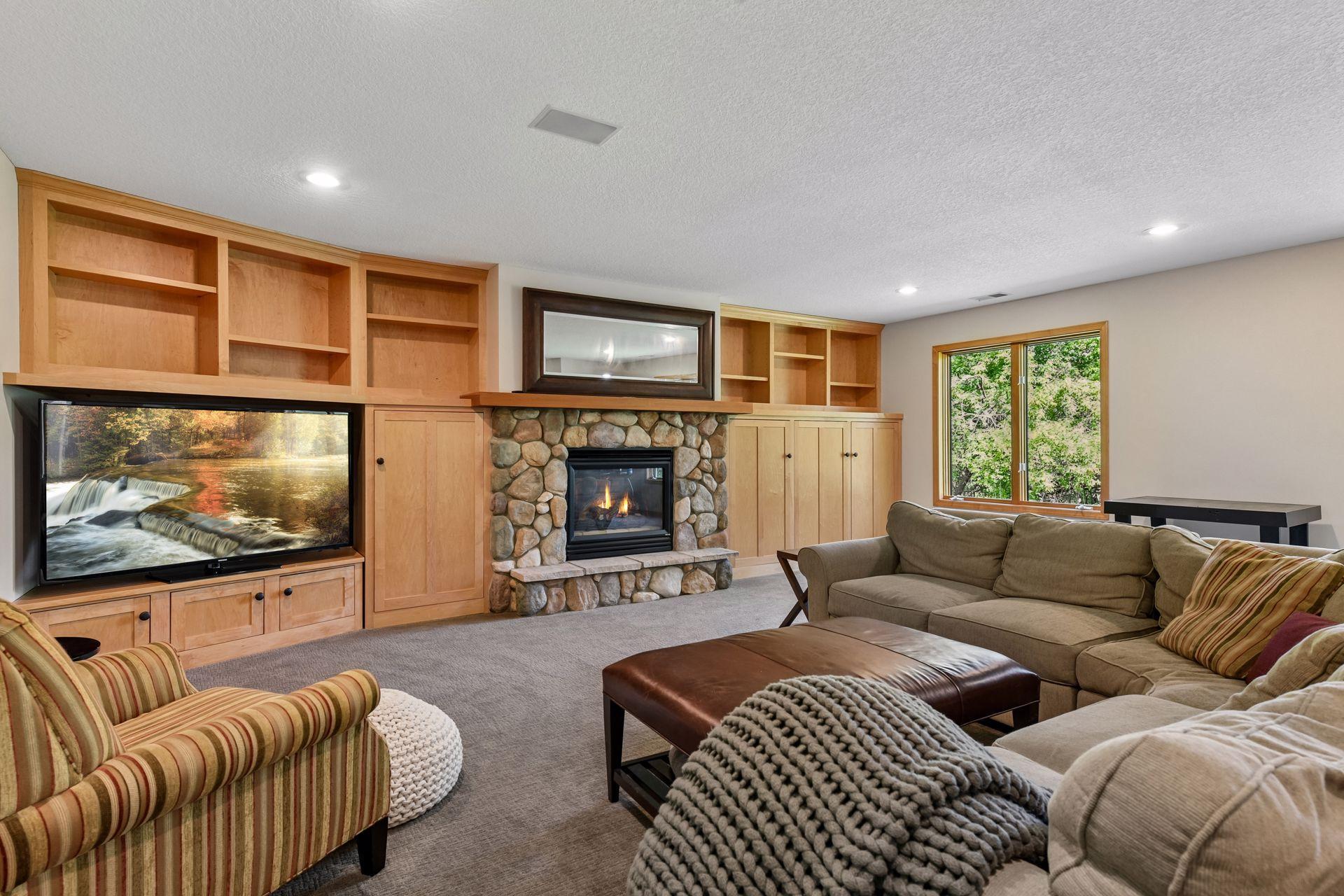 Lower level family room, lots of room for the BIG game and movie night!