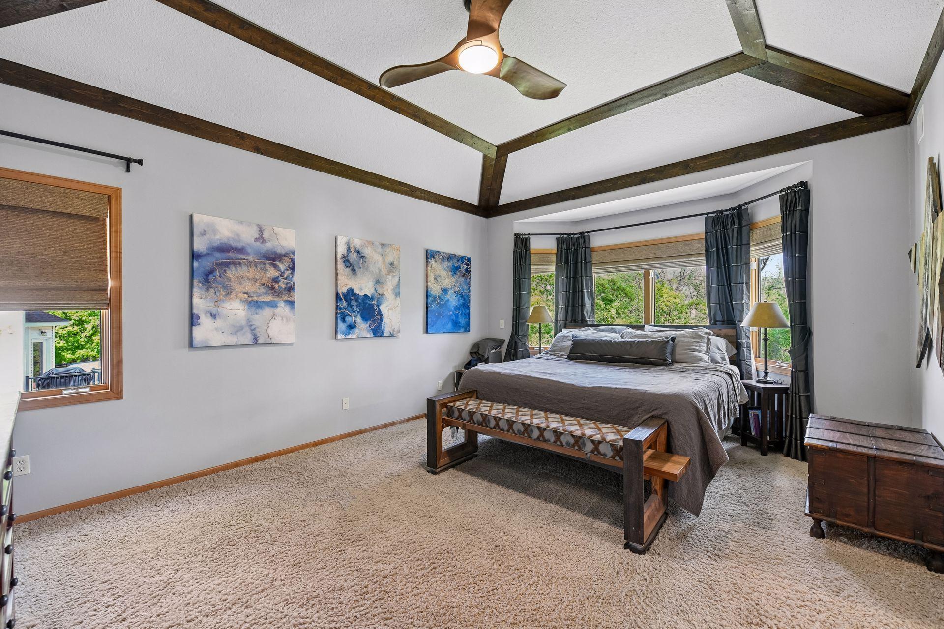 Primary Suite featuring large walk-in closet and gorgeous bath