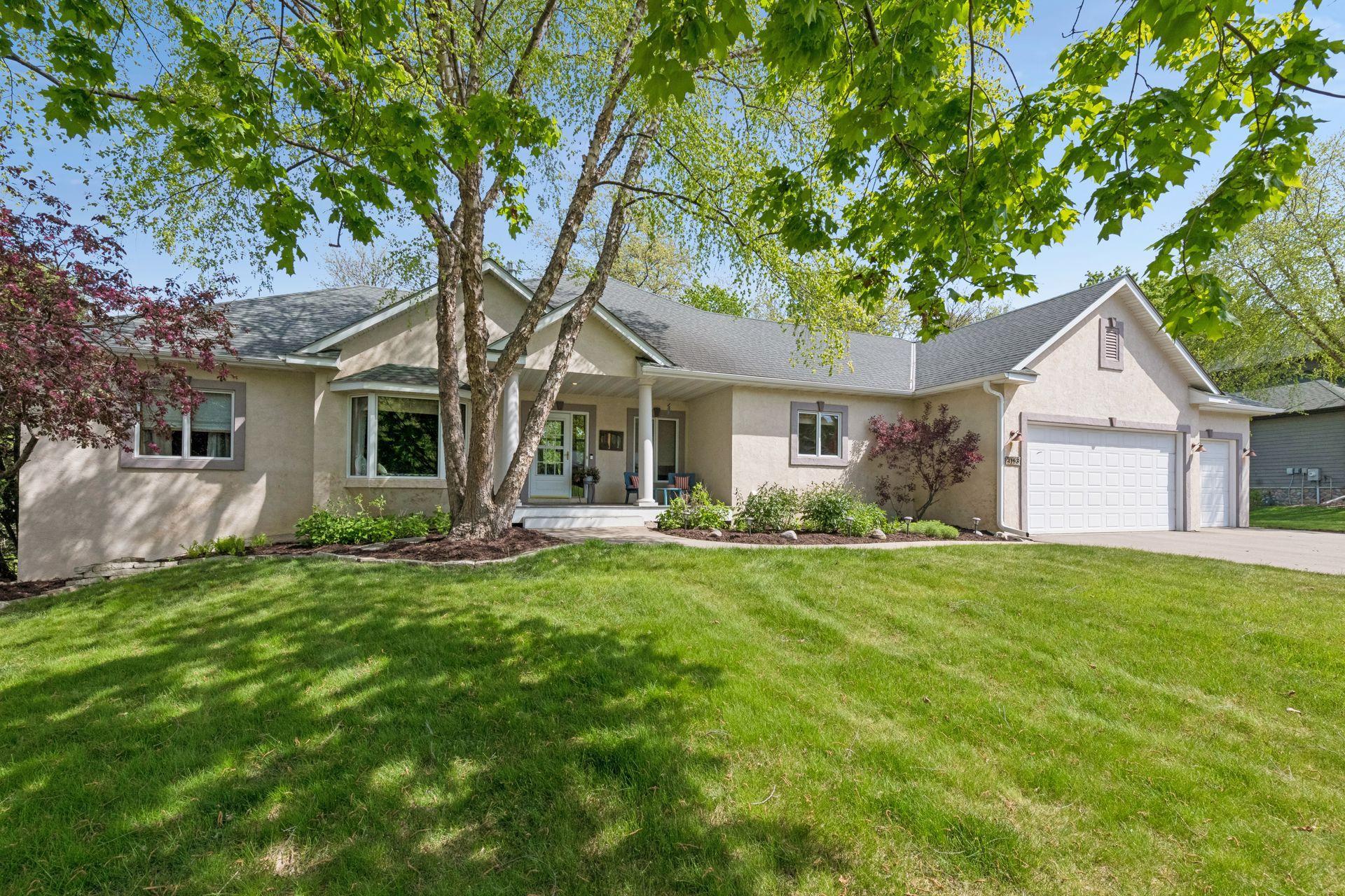 Spacious 4 bed/4 bath walkout rambler with 3 car garage.