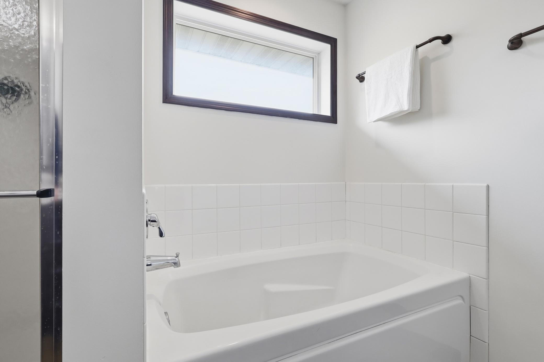 Soaking tub and separate shower in the primary bath