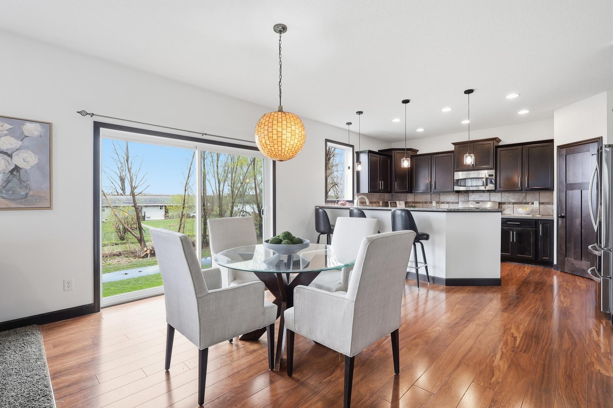 The dining area flows effortlessly to your future deck