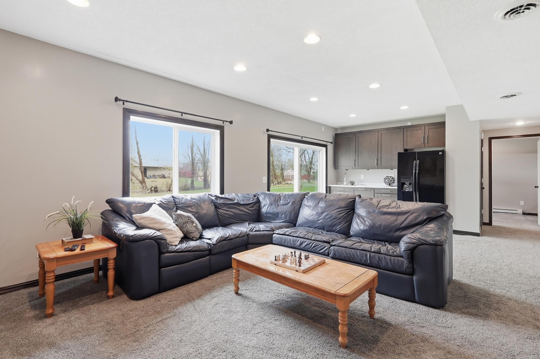 Large window and slider allow for tons of natural light to flood the room