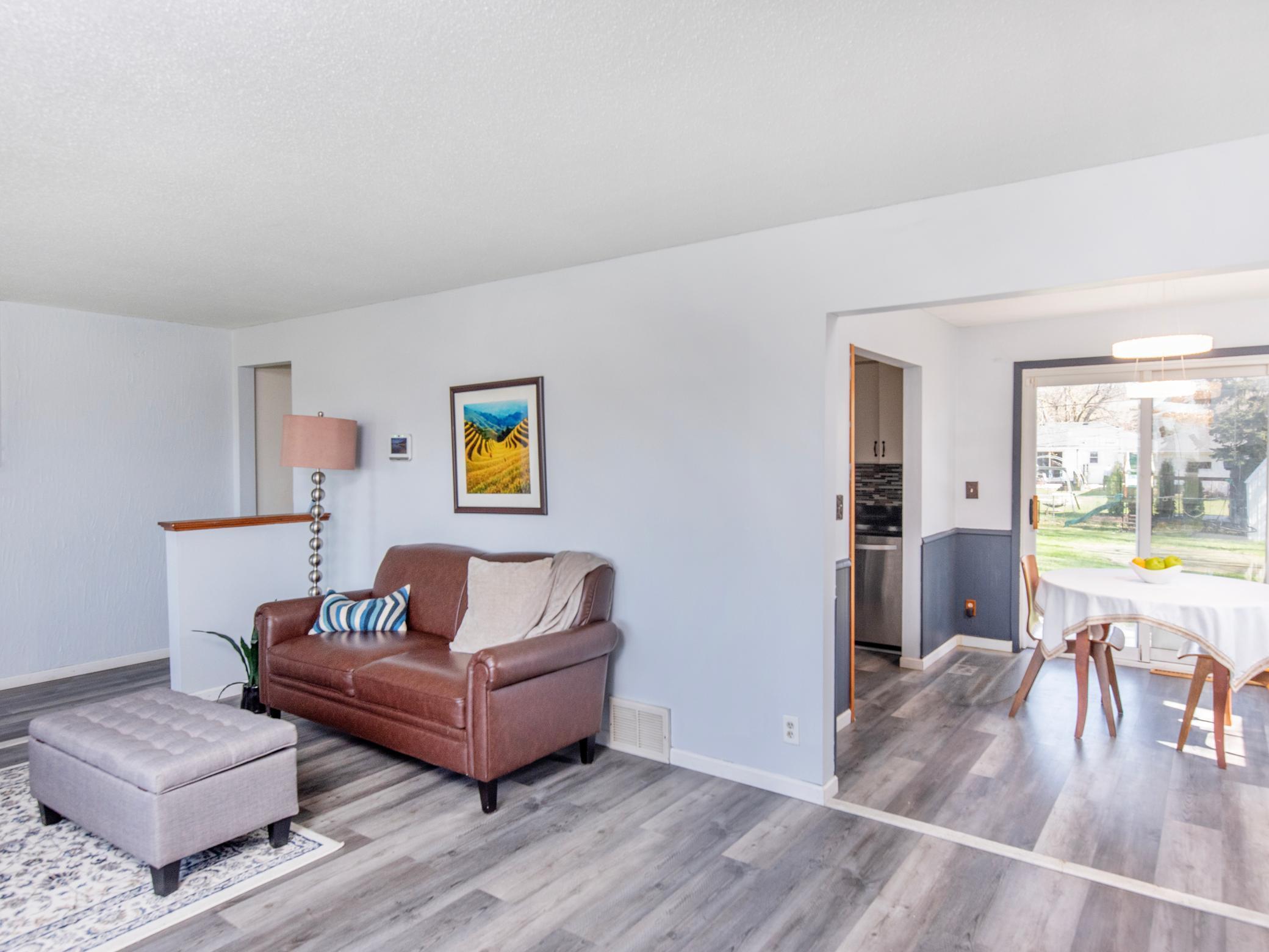 Newer flooring and fresh paint throughout the main level.