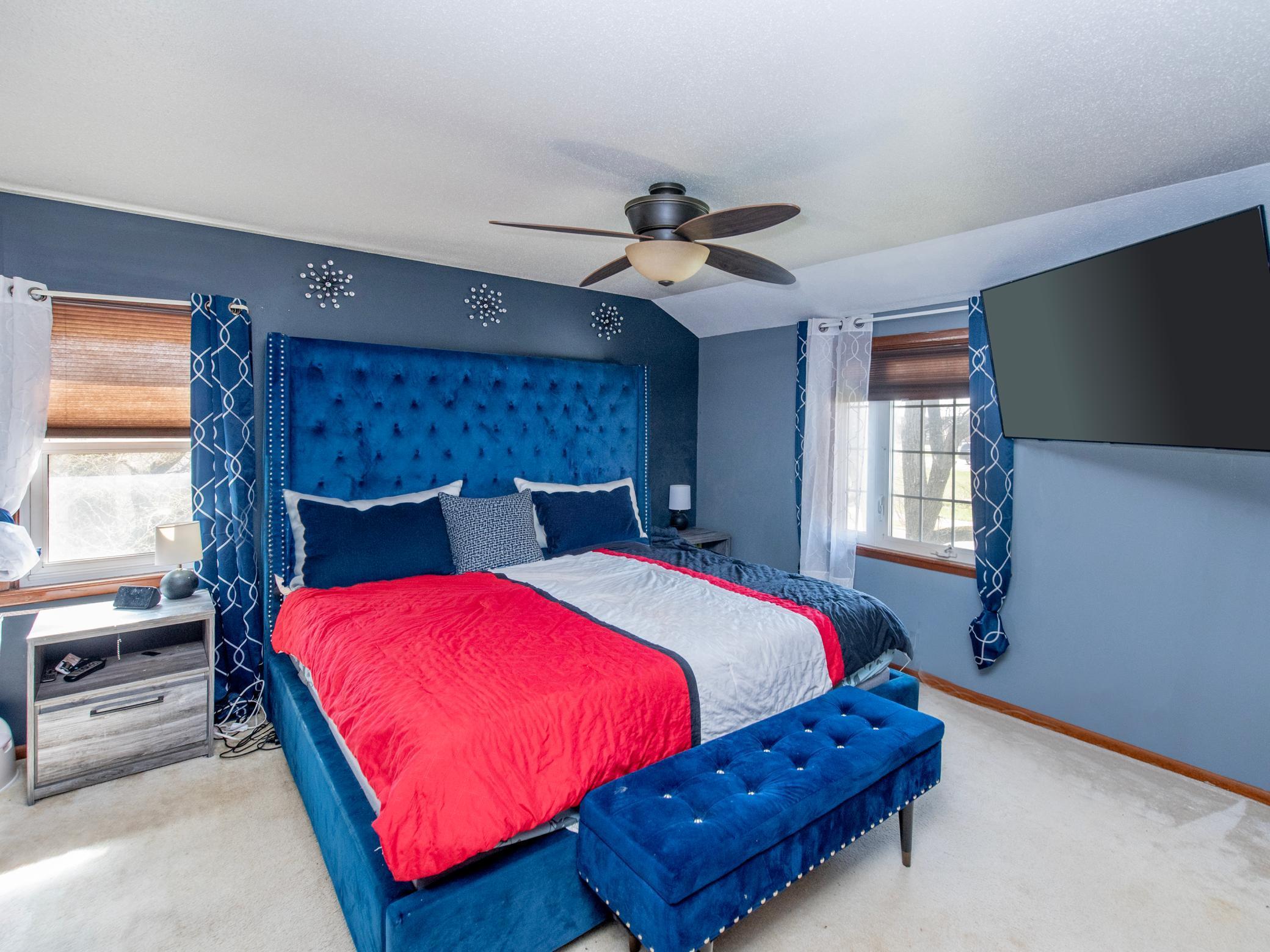 One of four large upper level bedrooms