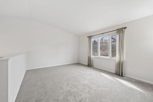 Large, bright family room with vaulted ceilings