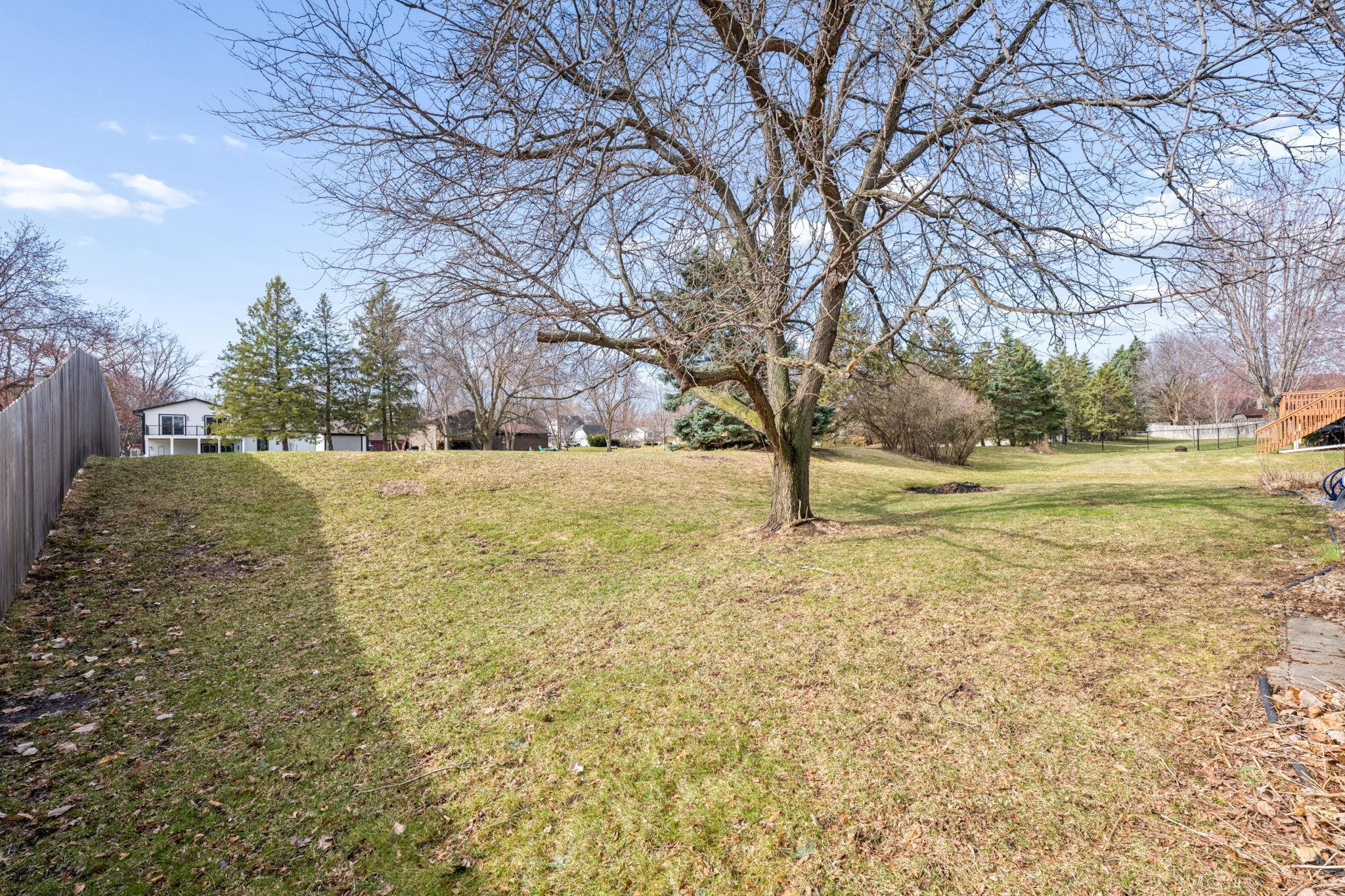 Enjoy summers in Minnesota in your large back yard with room for a garden, fire pit and other outdoor activities!