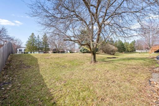 Enjoy summers in Minnesota in your large back yard with room for a garden, fire pit and other outdoor activities!