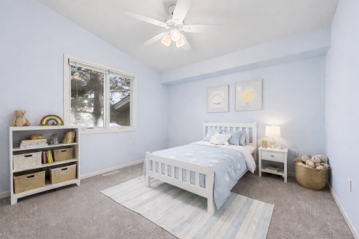 Bright secondary bedroom on the upper level.