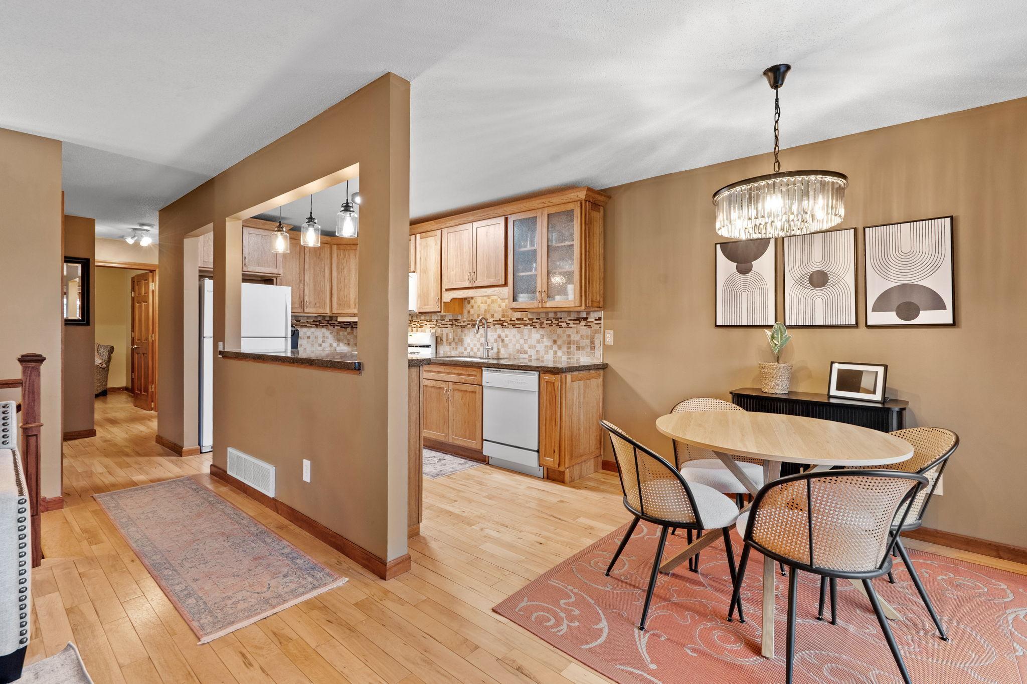 Tastefully updated kitchen with breakfast bar and granite countertops