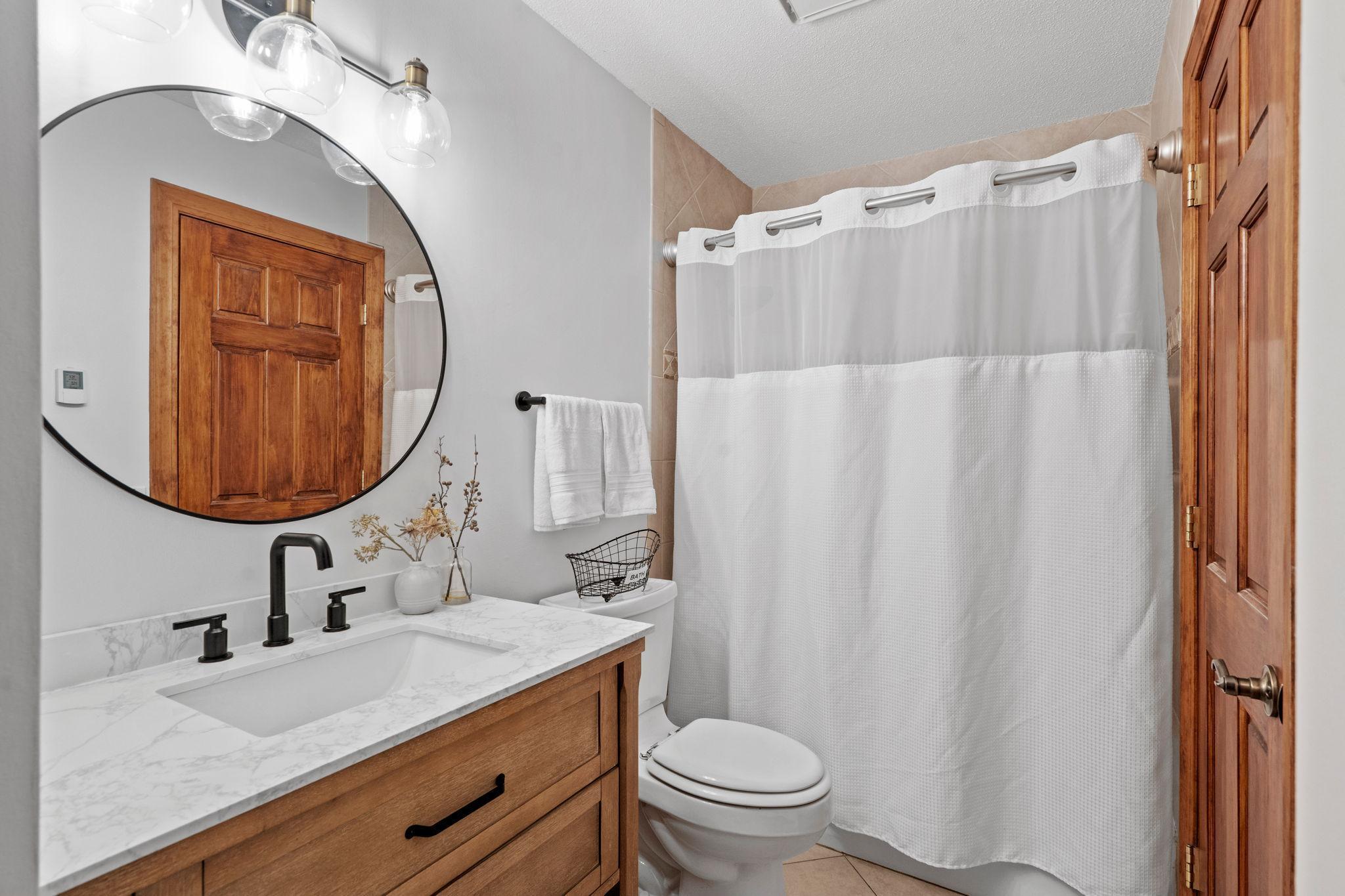 Beautifully updated full bath with heated floors!