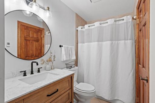 Beautifully updated full bath with heated floors!