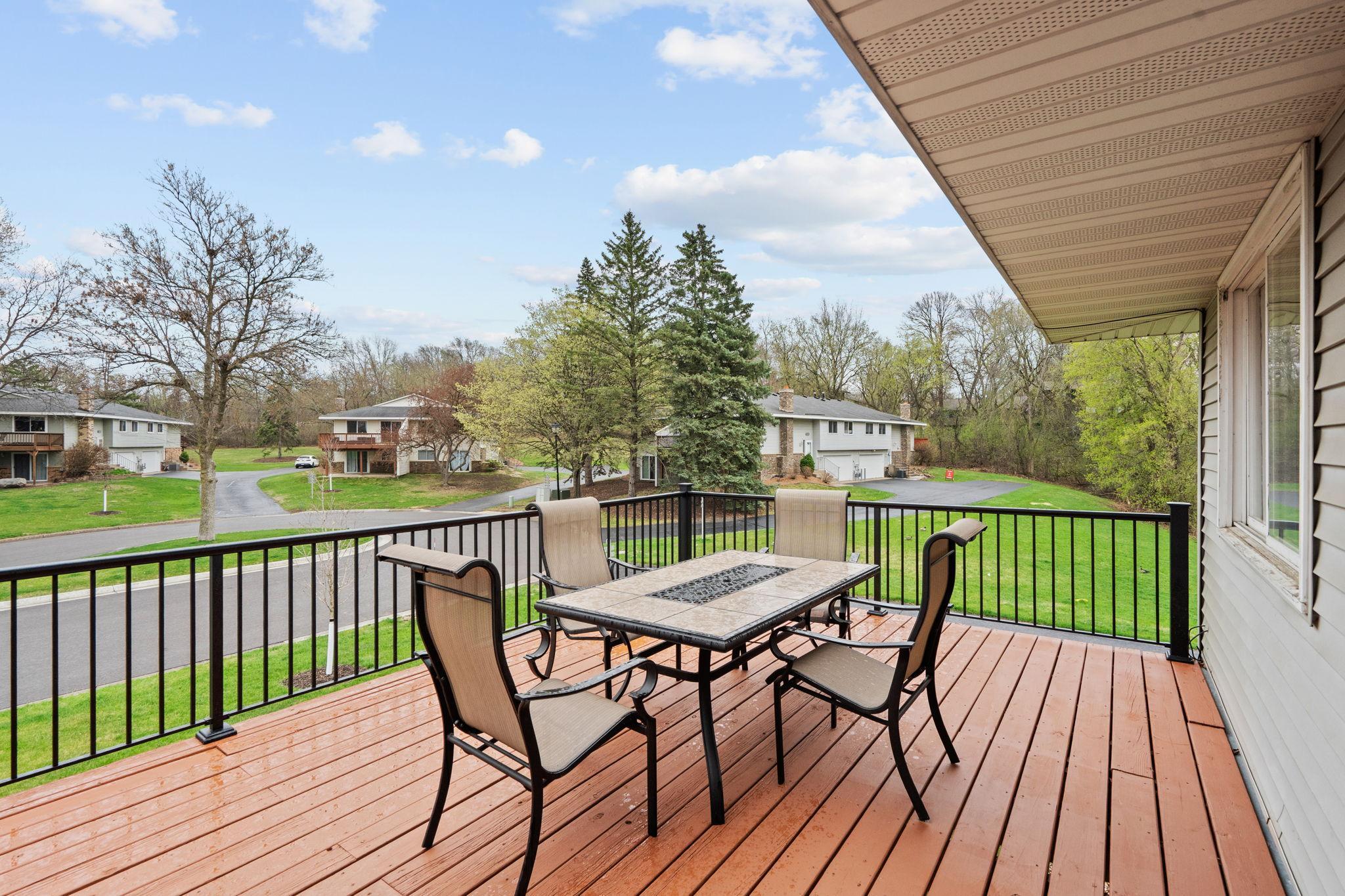 Deck newly refreshed with staining and new rail system