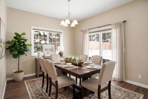 Separate formal dining room overlooking the patio and backyard
