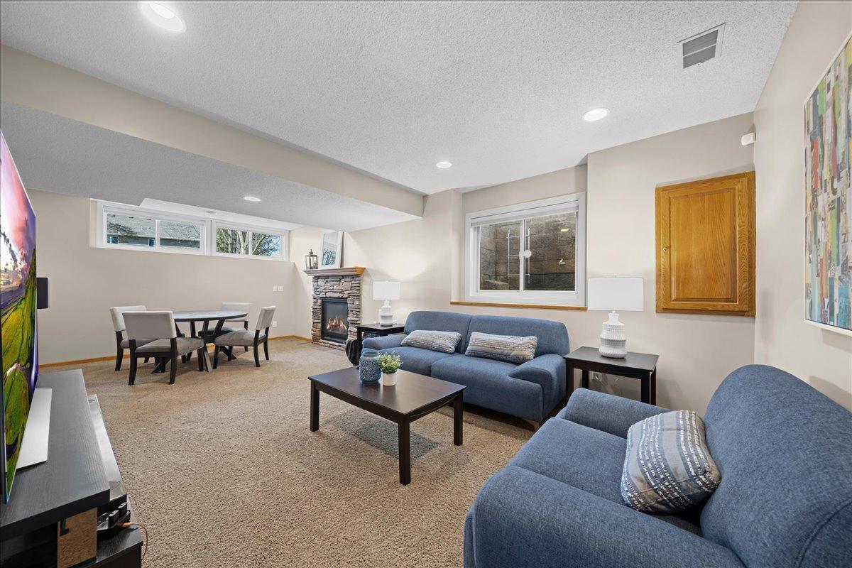 Lower level family room with gas fireplace.