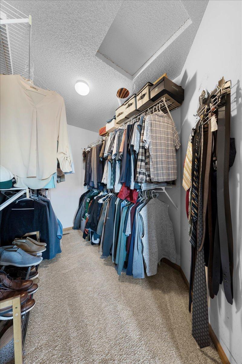 Primary bedroom walk-in-closet.