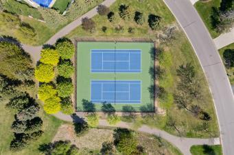 Walking paths and tennis courts nearby.
