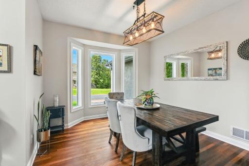 Formal dining room with beautiful bay windows