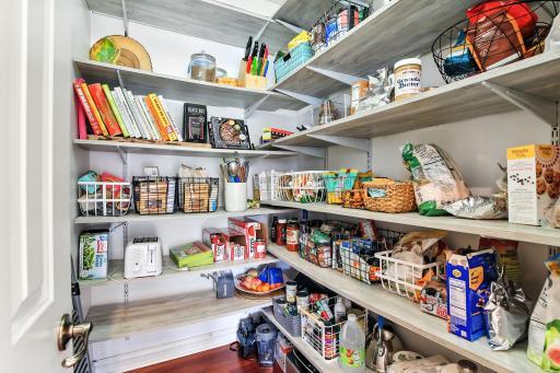 Spacious pantry located off of the kitchen