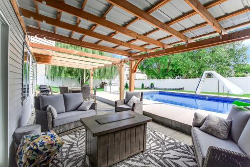 Spacious lower level with fireplace, full kitchenette, and new carpeting in 2025