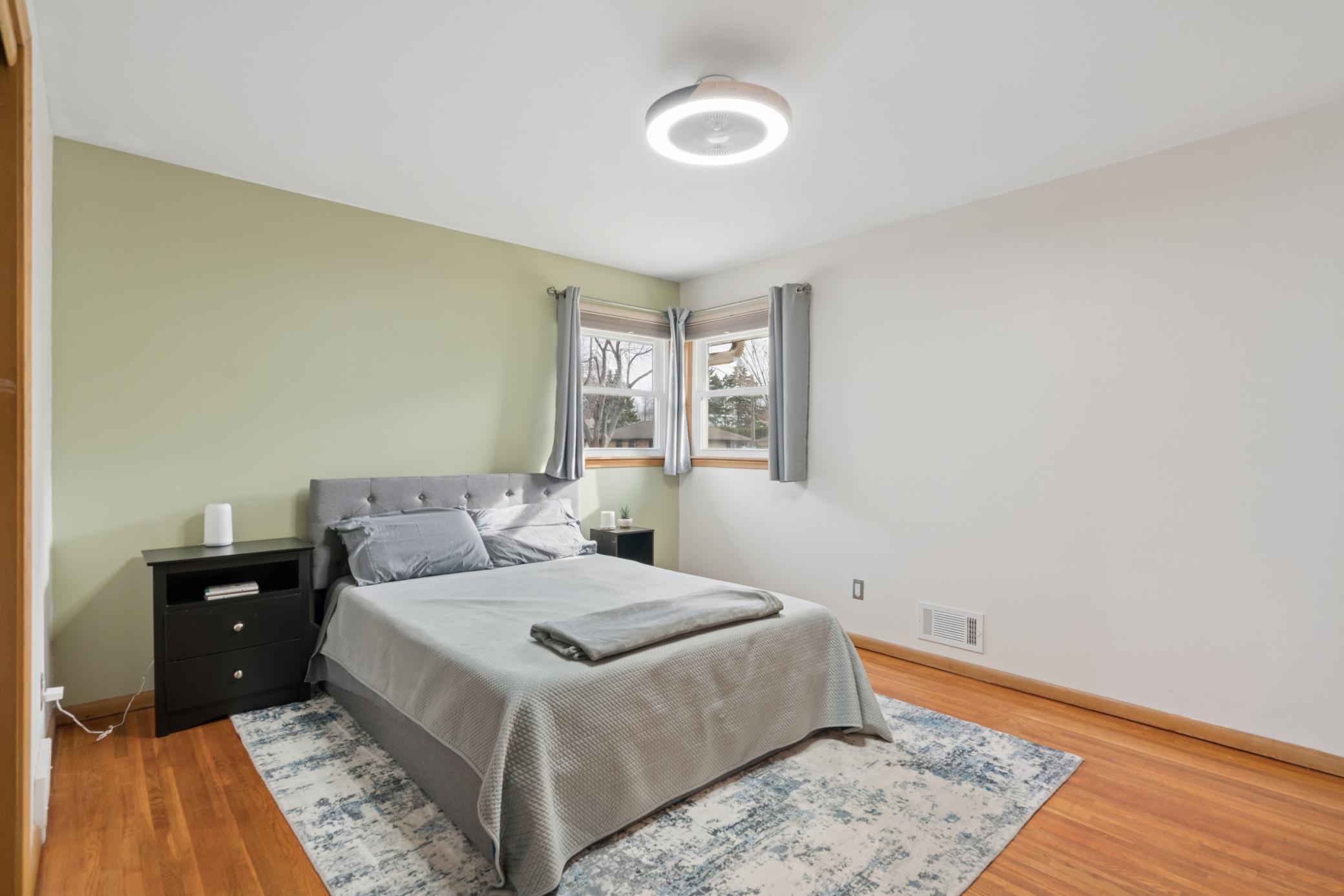 Main-level primary bedroom with great natural light and ample closet space