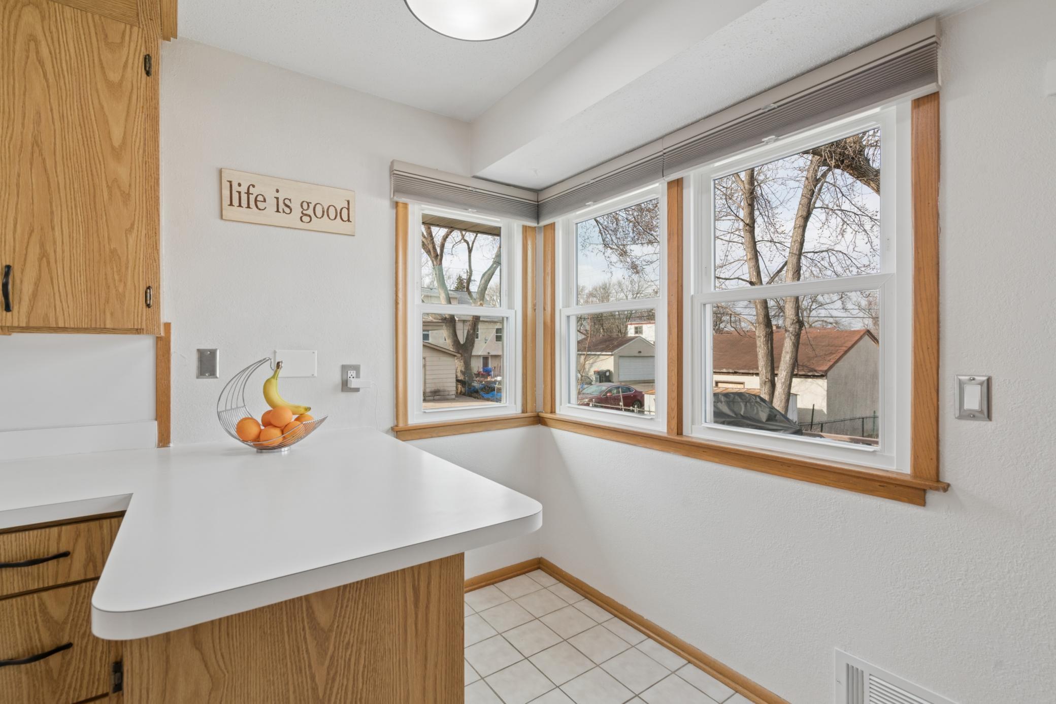 Kitchen filled with natural light and space for bar stool seating